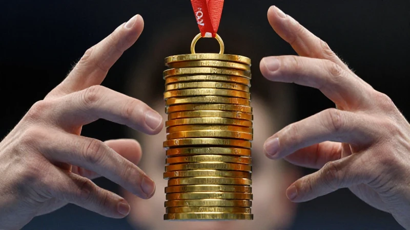 Cuánto oro se utiliza para hacer las medallas olímpicas 2 Medalla olímpica dorada, manos y luz dramática